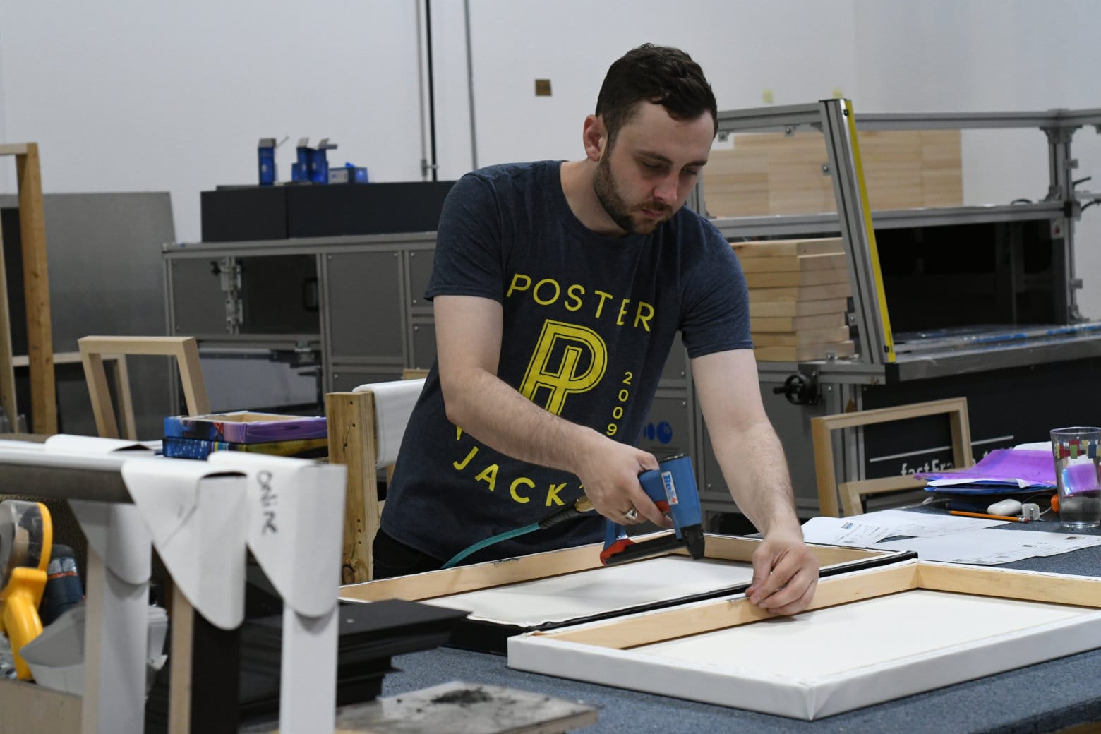Making high quality photo prints in Posterjack's print shop in Toronto, Ontario