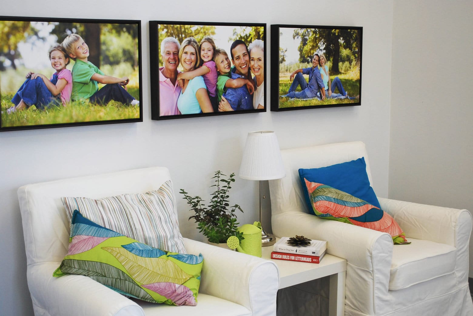 Framed Canvas Prints Displayed on the Wall with Family Photos Printed