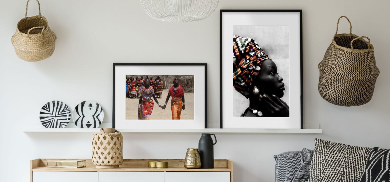 Framed pictures in different sizes displayed on the wall