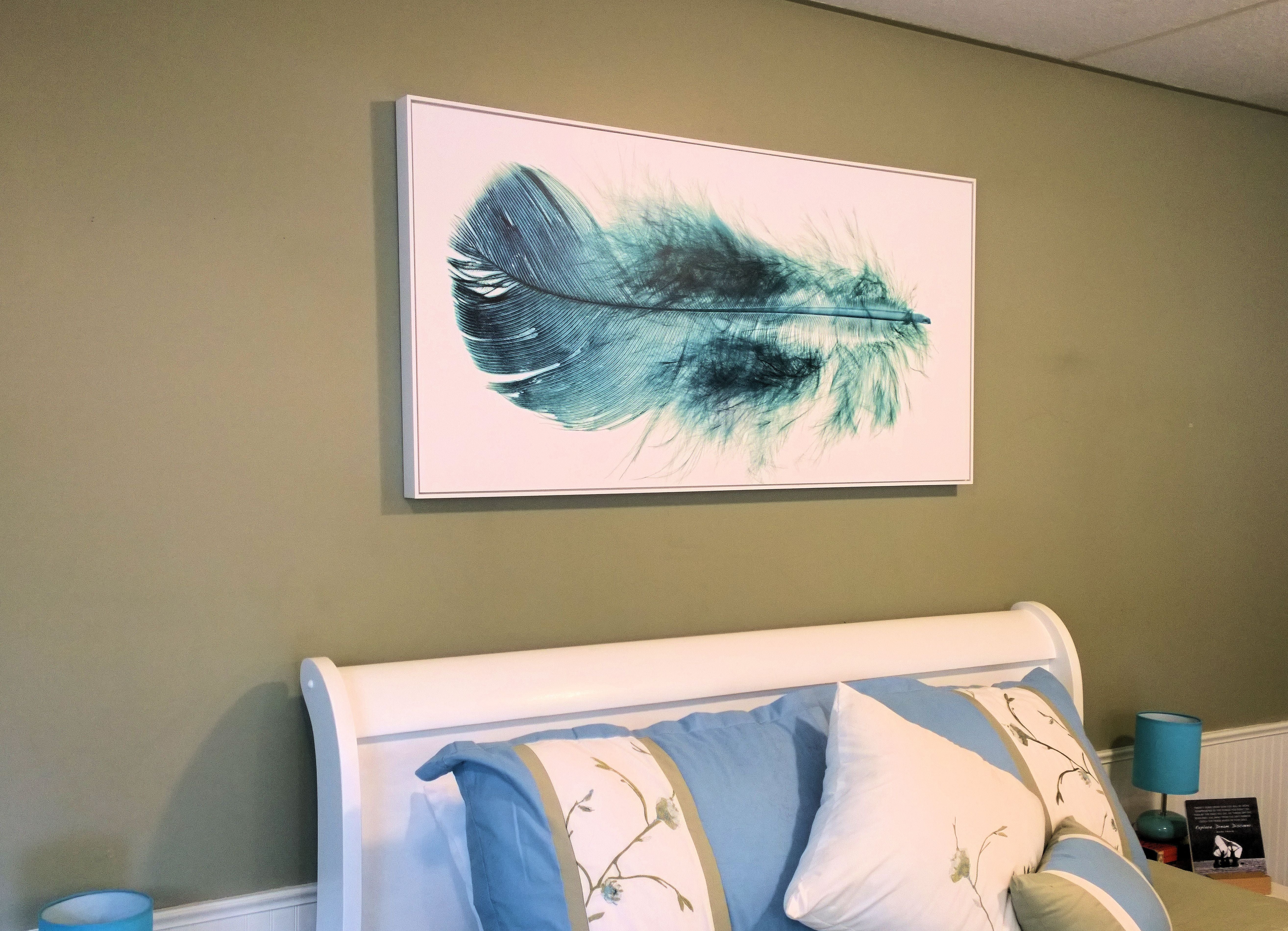 Room makeover project - large Posterjack Gallery Box above the bed with a feather photo from the Posterjack Art Shop
