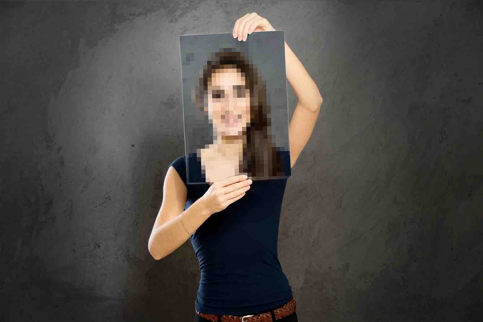 Woman Holding a Low Resolution Photo Print