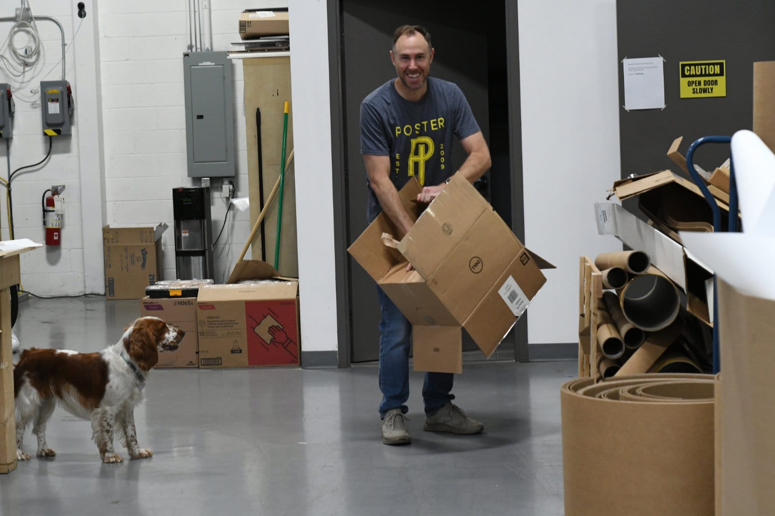 Posterjack President, Tim Faught, and Maple the Print Shop Dog in Toronto