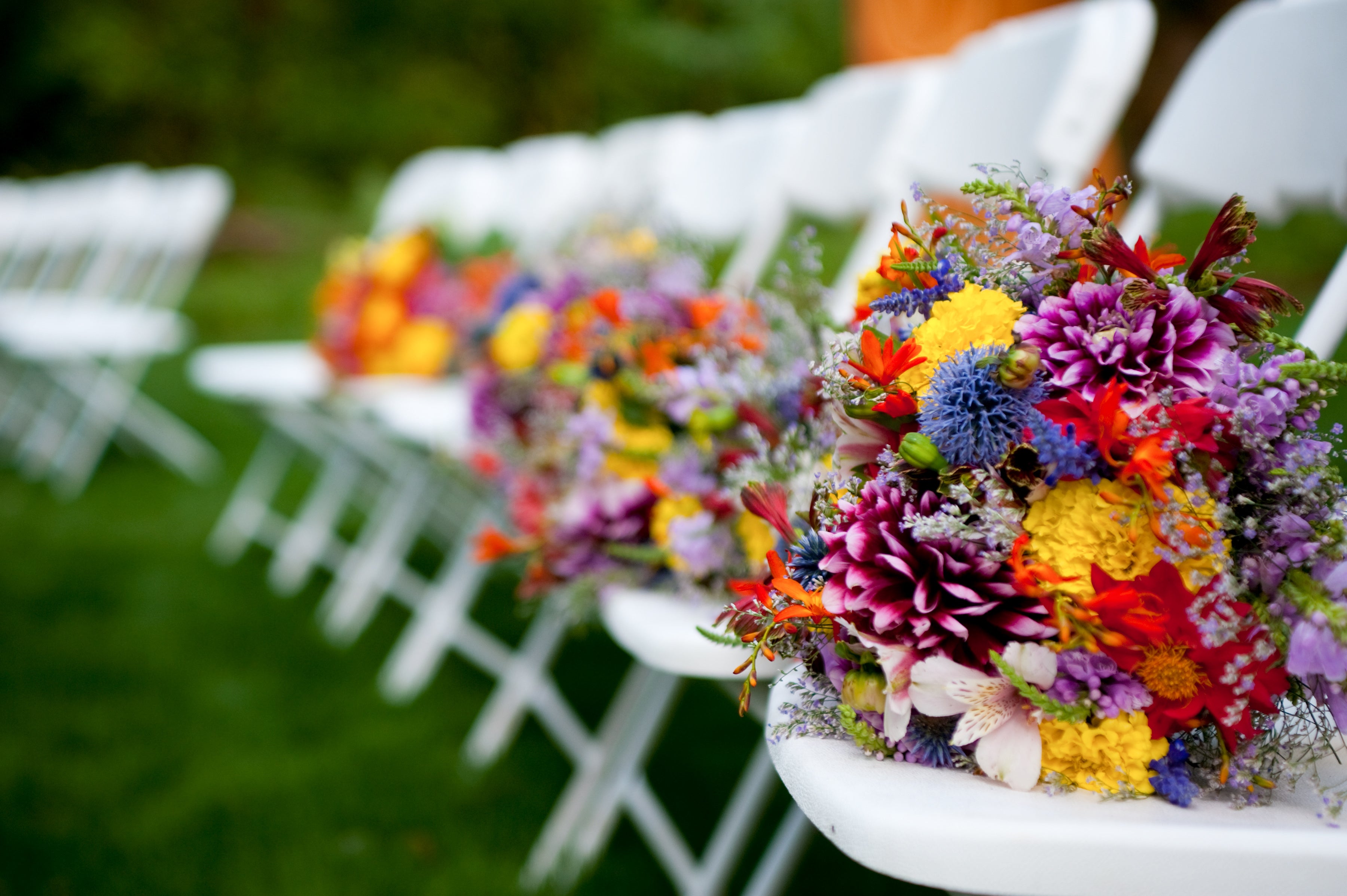 Bridesmaids' bouquets wedding flowers on chairs