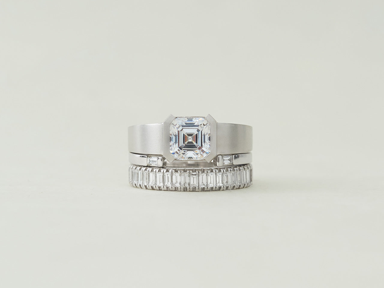 The Center Half Bezel (Asscher), The Open Baguette, The Column Baguette rings by Holden in white gold