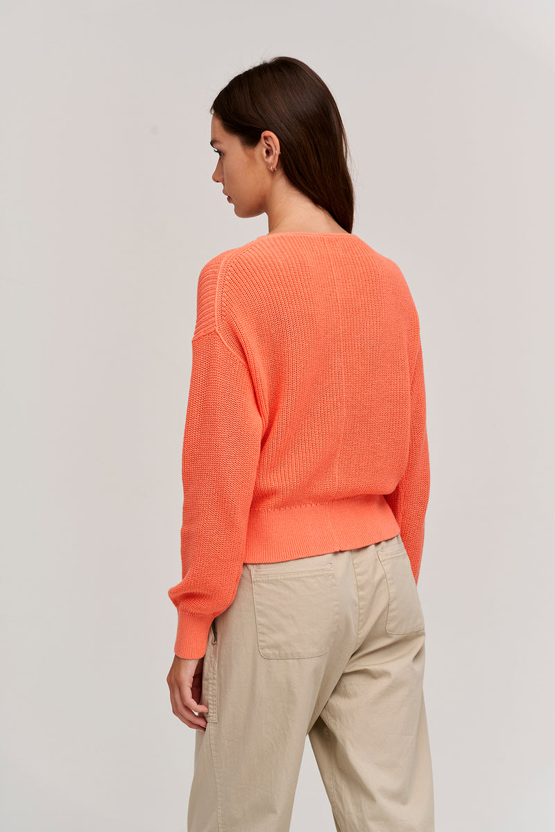 solange in coral back sweater