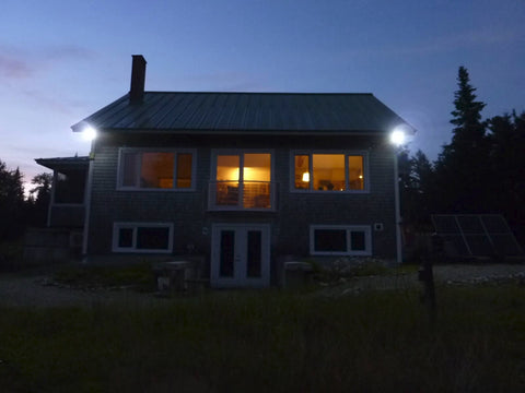 10 Watt Marine floodlights illuminating outside of house in Pownal Maine in the evening