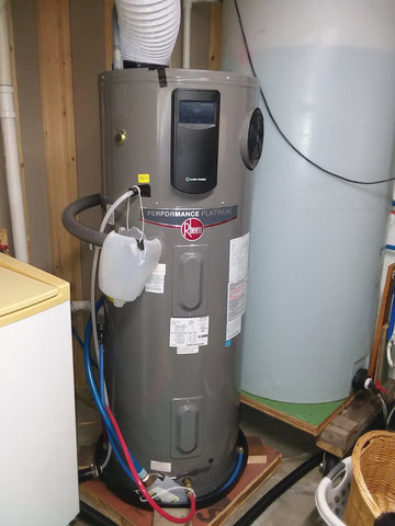 Hybrid 55 gallon hot water tank. 2/3 of the year there is excess power, which goes to heat water: