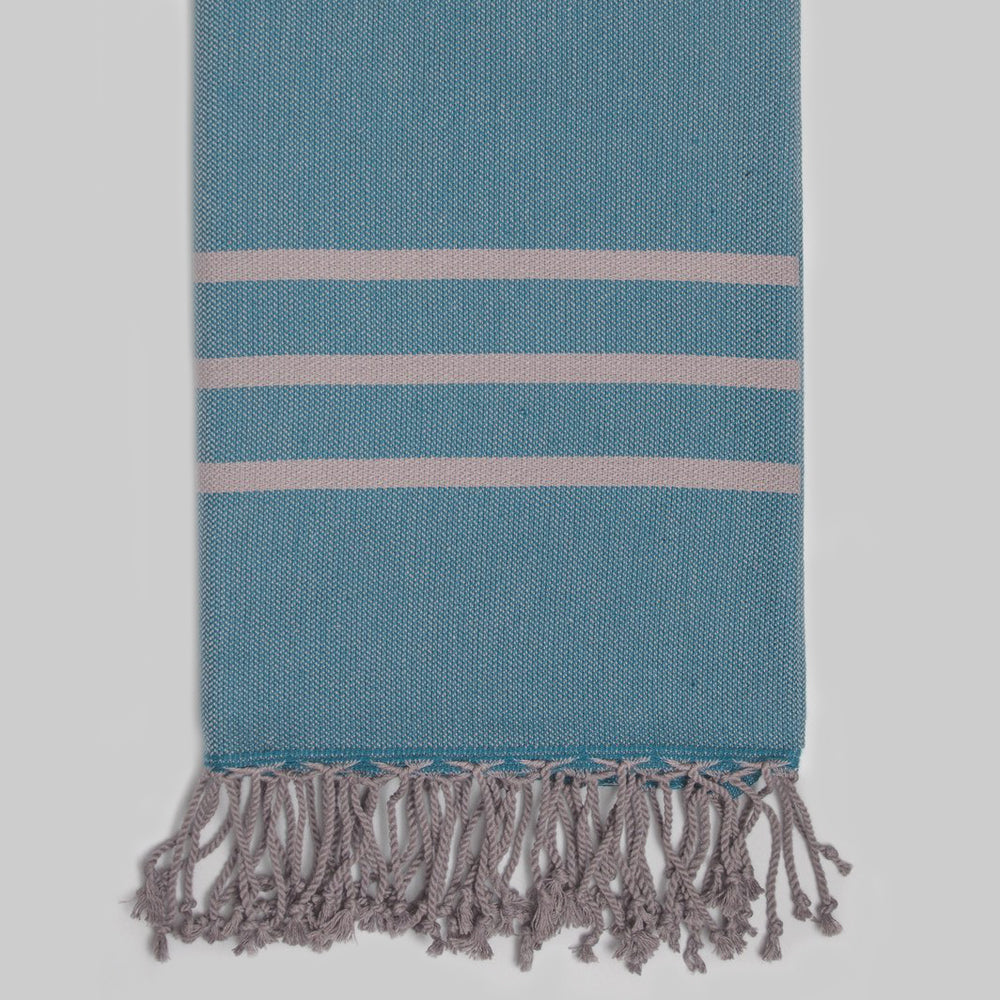 https://cdn.shopify.com/s/files/1/3066/1358/products/Antiochia-Grey-Collection-Bath-Towel-Teal-1.jpg?v=1623851863