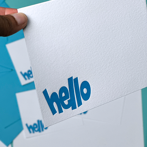 Letterpress Notecards with the word hello printed in blue