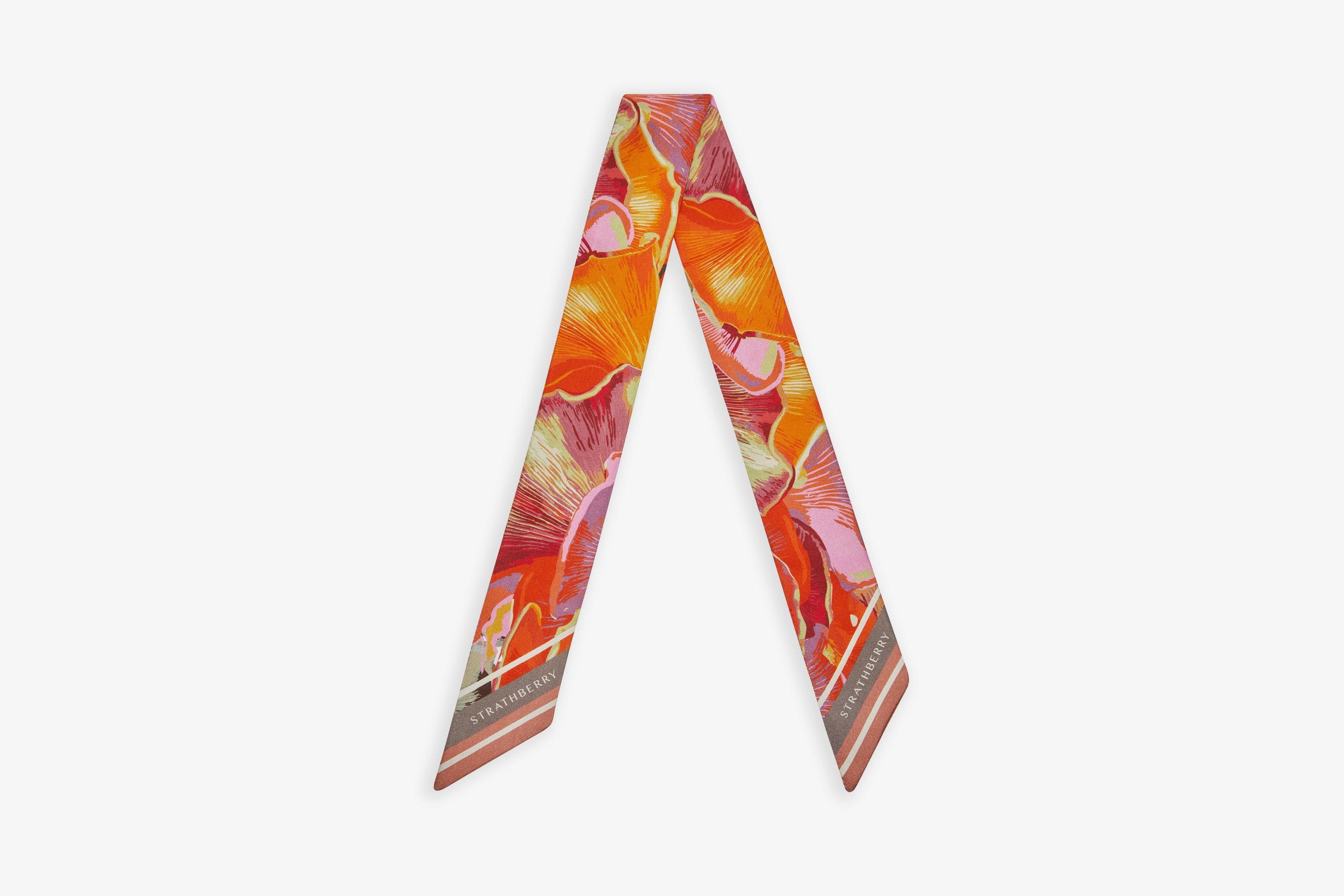 A view showcasing our Silk Skinny Scarf - Pink/Marmalade Mushroom Print