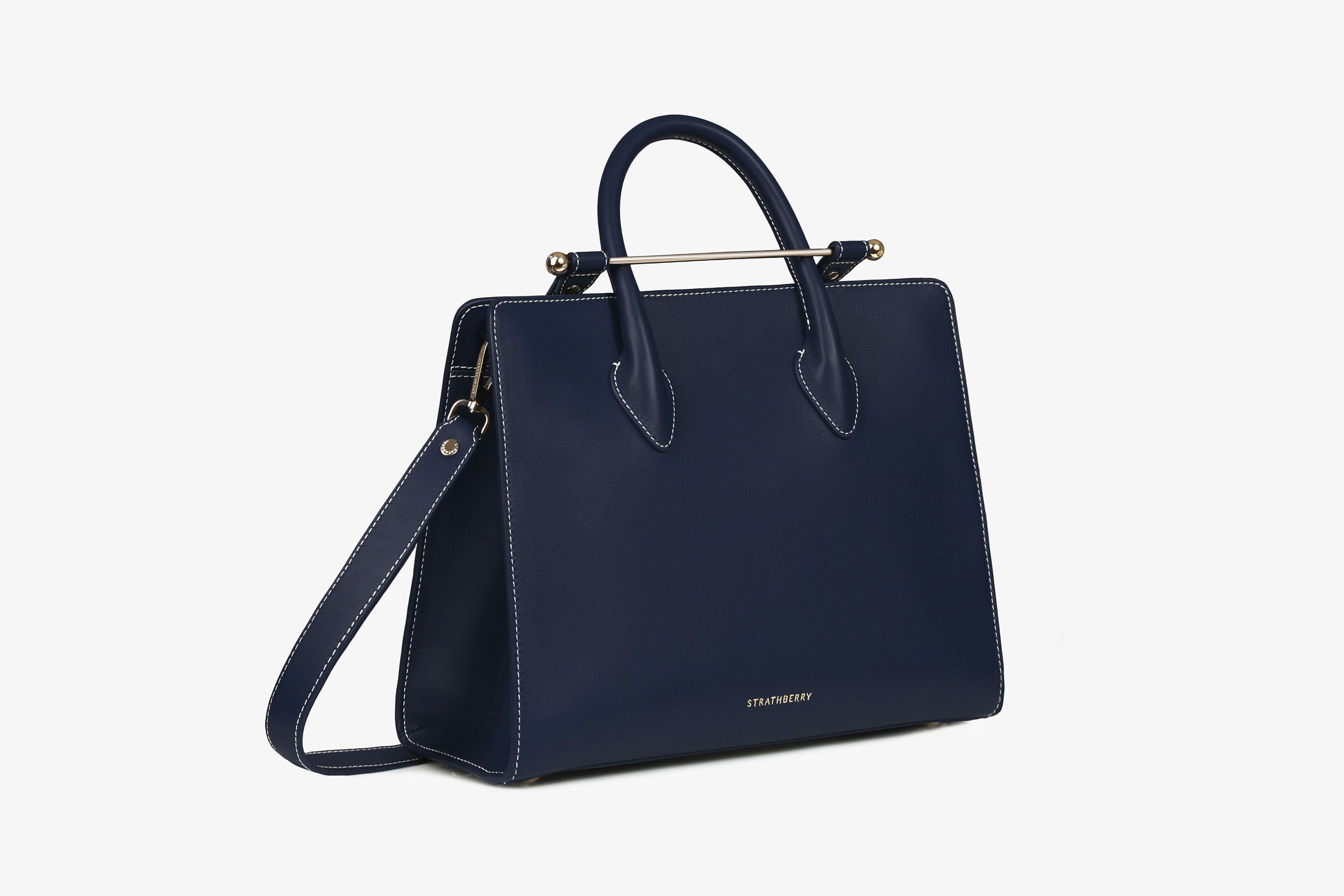 A view showcasing our The Strathberry Midi Tote - Navy with Vanilla Stitch