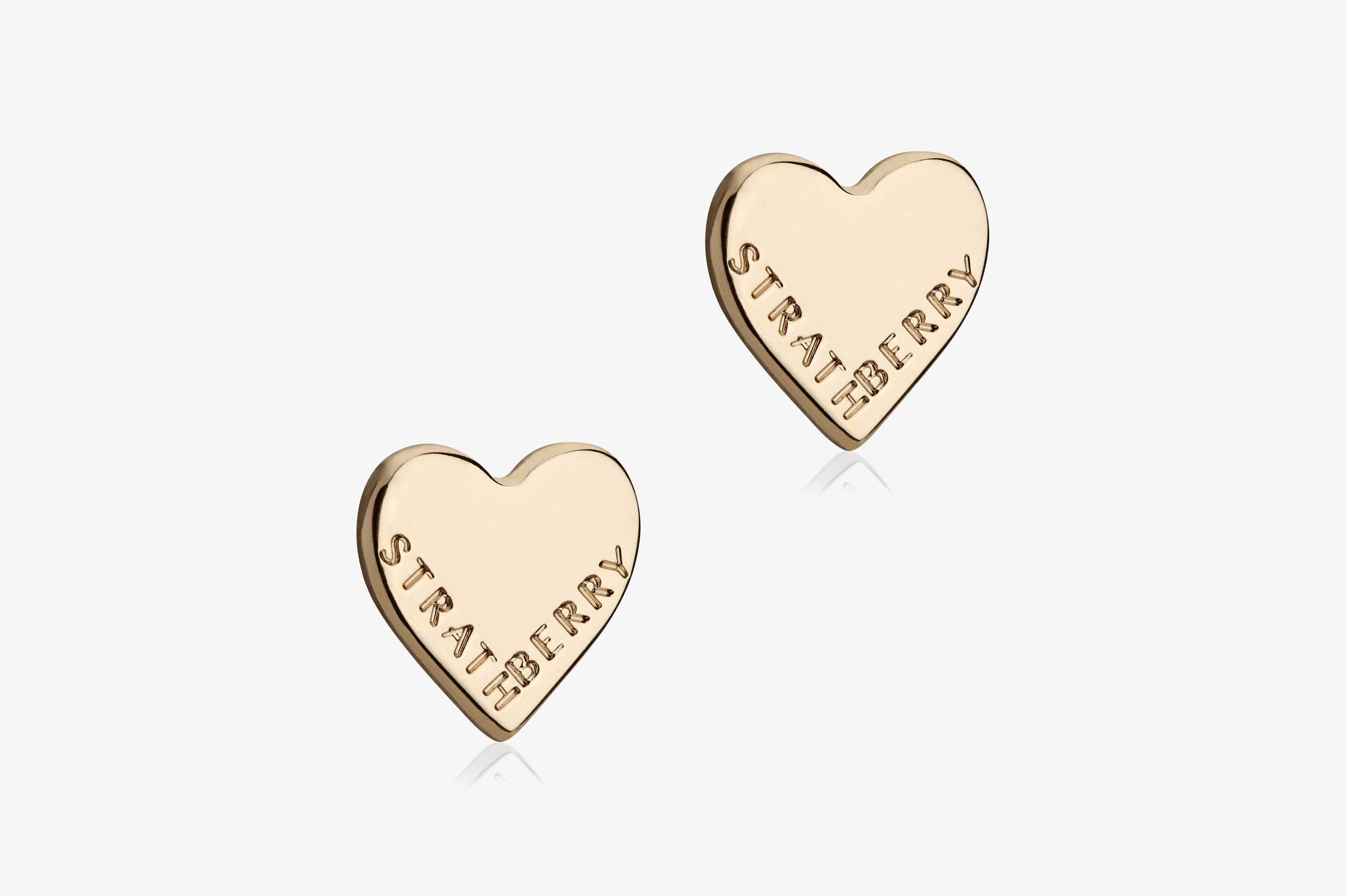 A view showcasing our Heart Stud Earrings - Gold