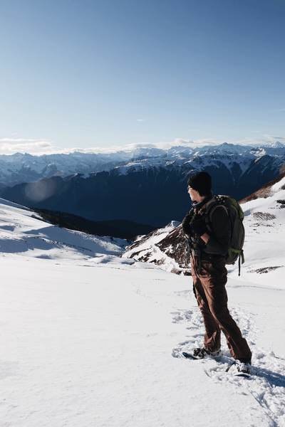 snowshoer with a beautiful view