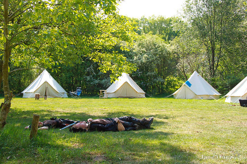 Tpw marêr sleeping in a camp 