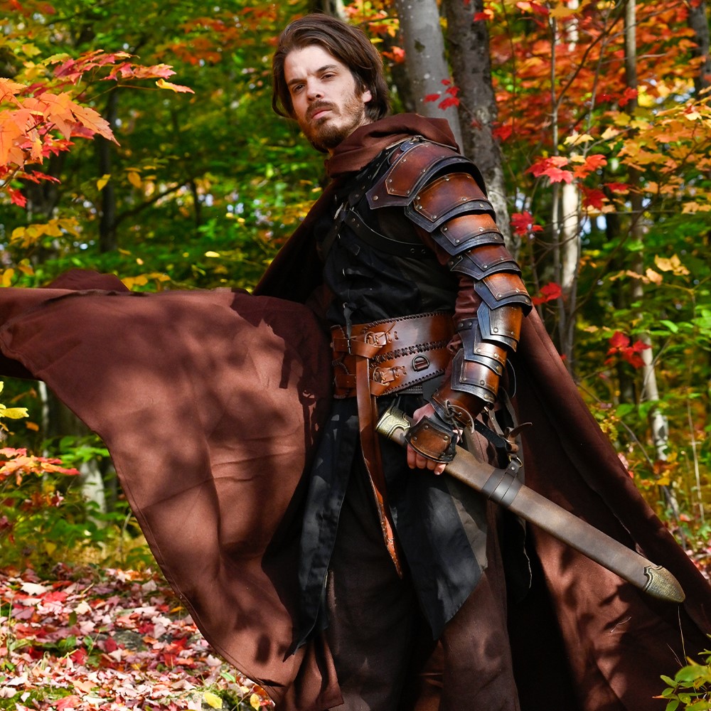 Larper with a leather sword holding with his hand a sword scabbard