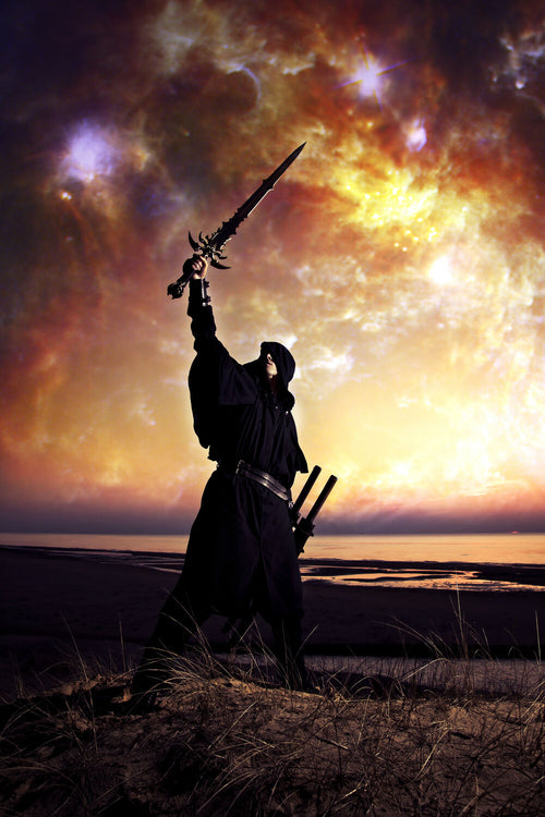 A warrior holding a sword with one hand above his head under a yellow sky