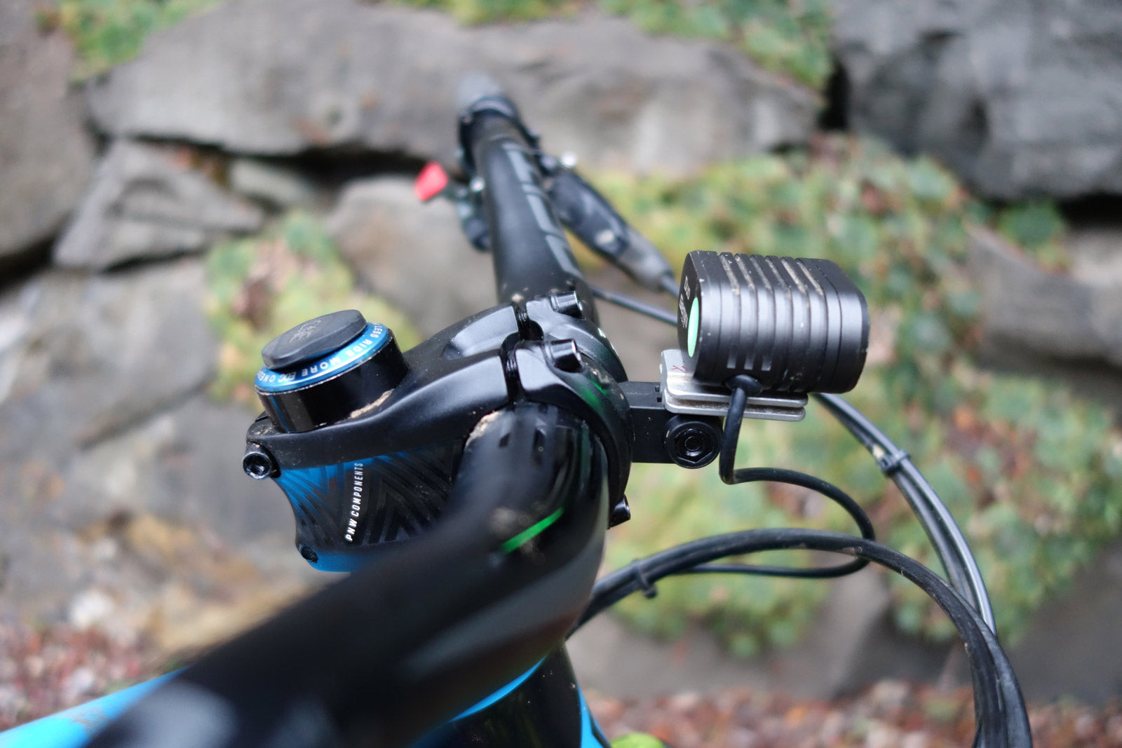 Gemino Duo bike light mounted to a PNW Range stem with GoPro mount