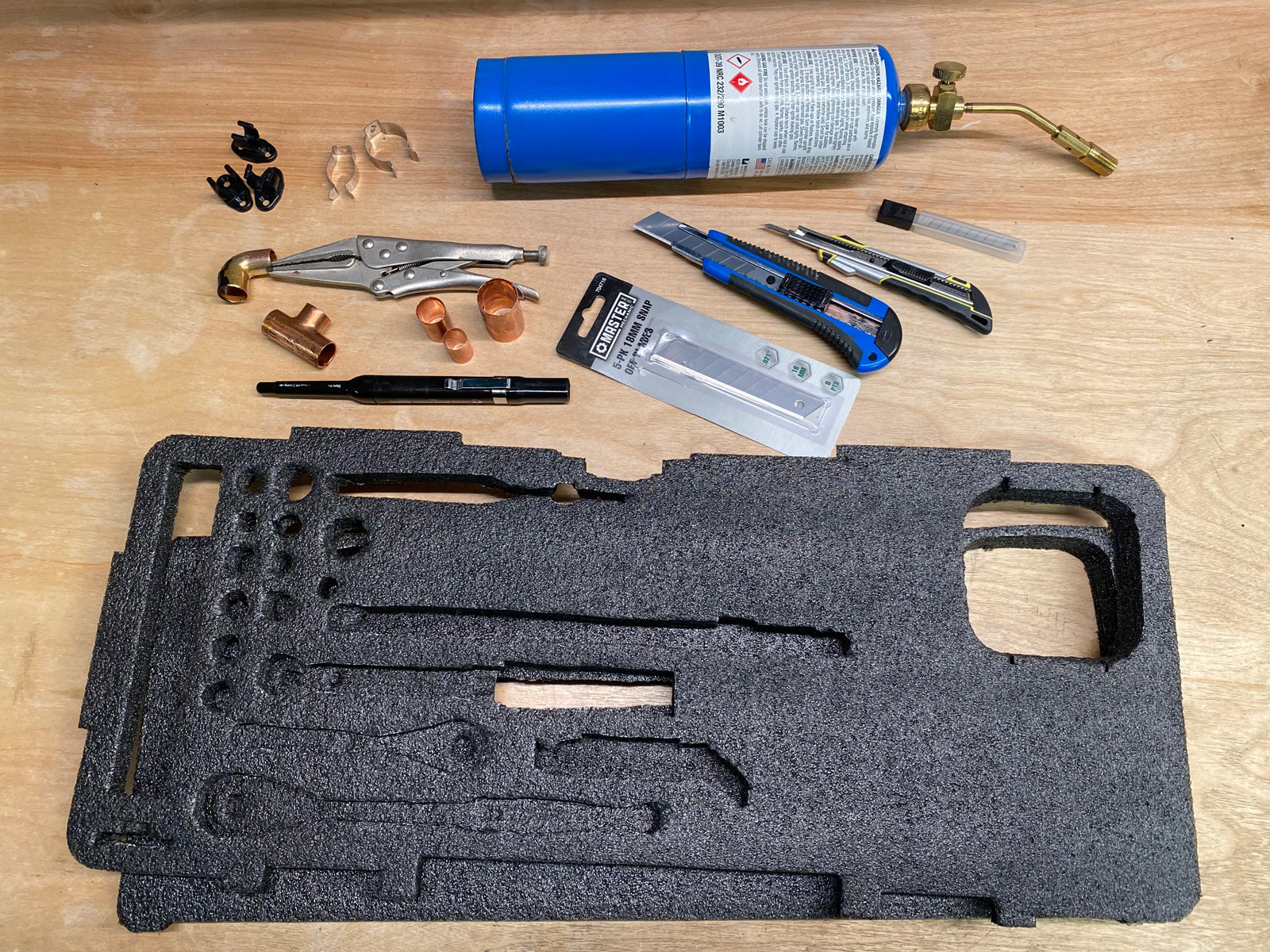 Supplies needed for organizing a mountain bike tool box with Kaizen foam