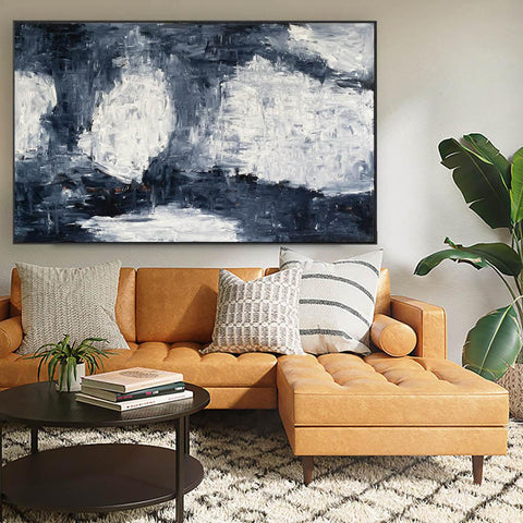 large oil painting in living room above sofa