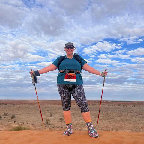 Cath walking in desert