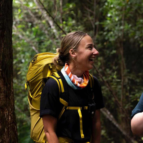 Samantha on the trail with backpack