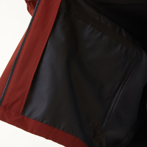 The inside of a waterproof jacket showing its sealed seams