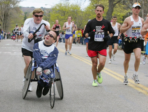 Dick Hoyt pushing his son Rick in Boston Marathon