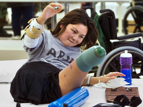 Tammy Duckworth in physical therapy