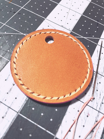 Vegetable tanned leather in rose color for front of Africa Hand Stitched Keychain.