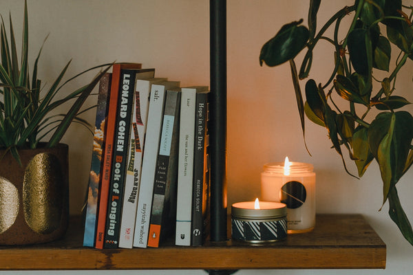 Candles on bookshelf