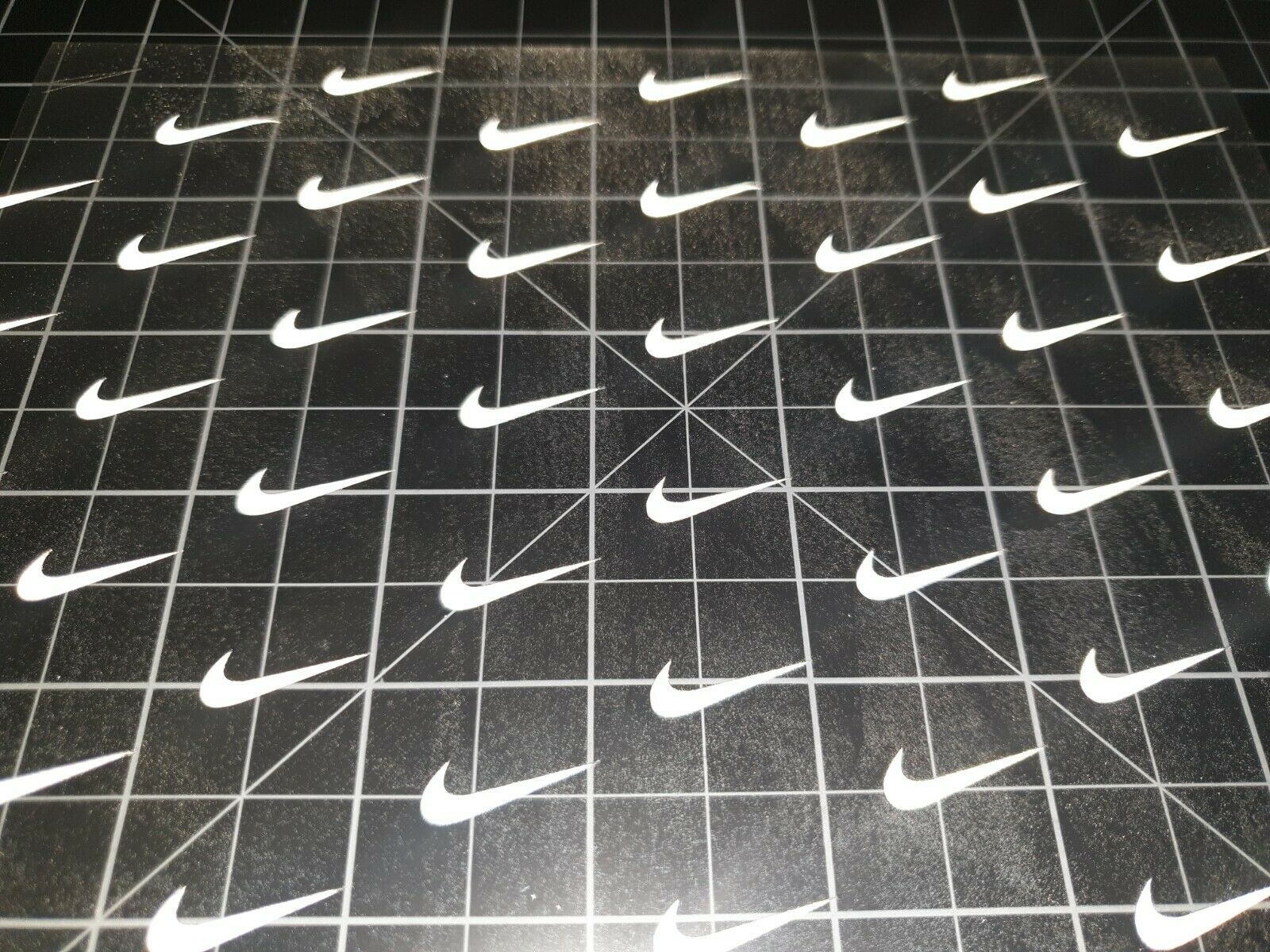 nike swoosh reflective