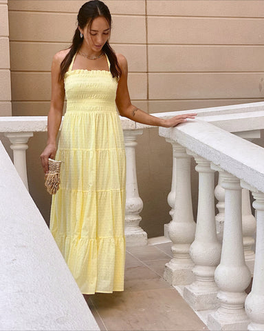 sunny yellow maxi dress halter neck summer heat outfit inspiration