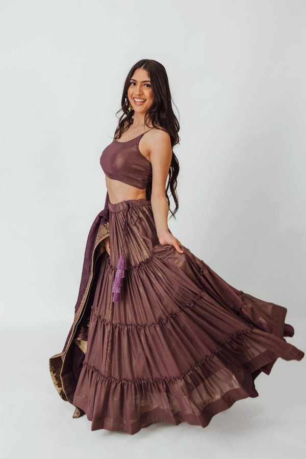 Purple Shimmer Tiered Lehenga with Gold Accents