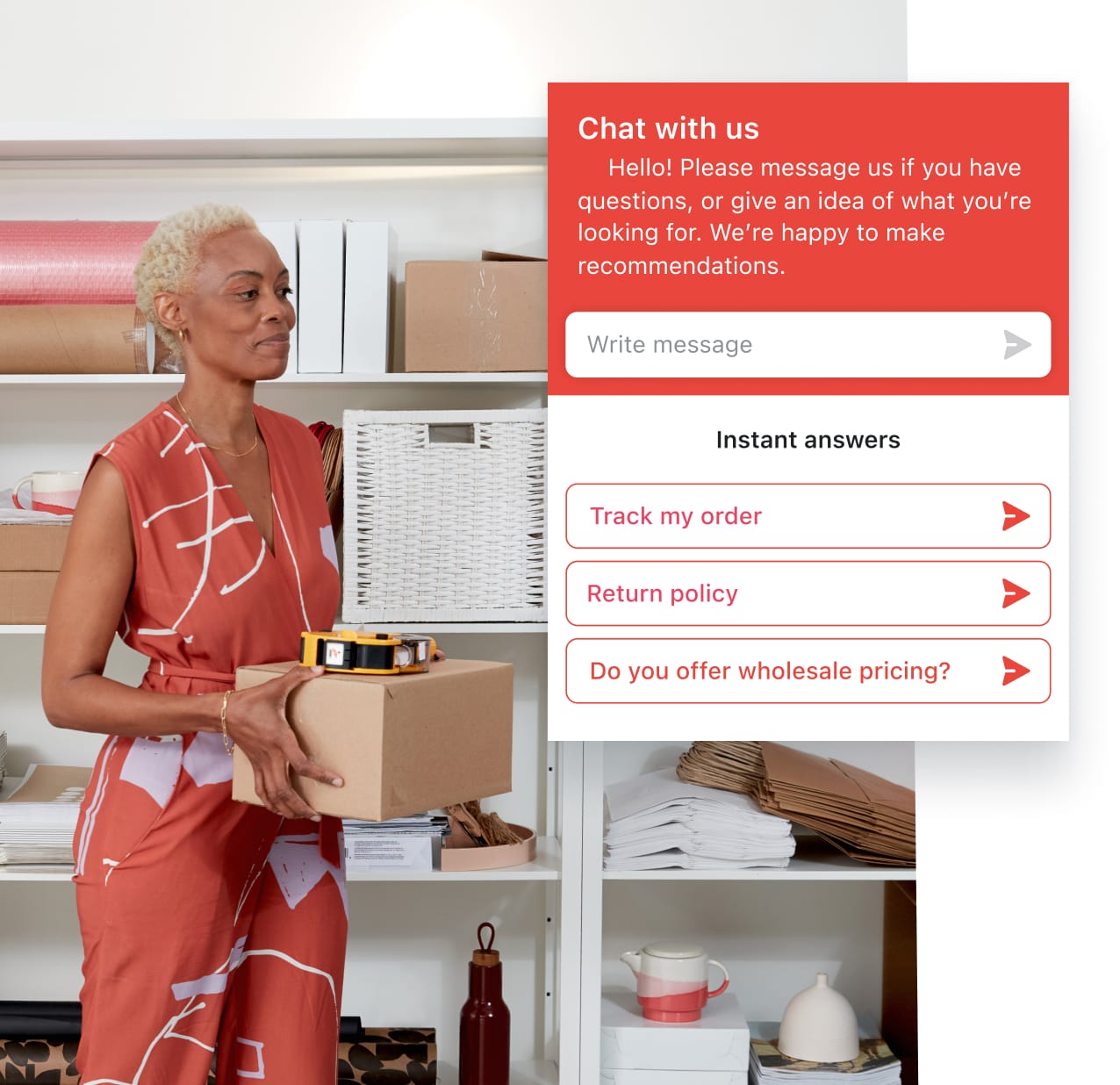 Business owner is standing in her back office carrying a box while doing inventory. Three instant answers are showing on screen, this feature of Shopify Inbox helps customers help themselves without the need for live chat.